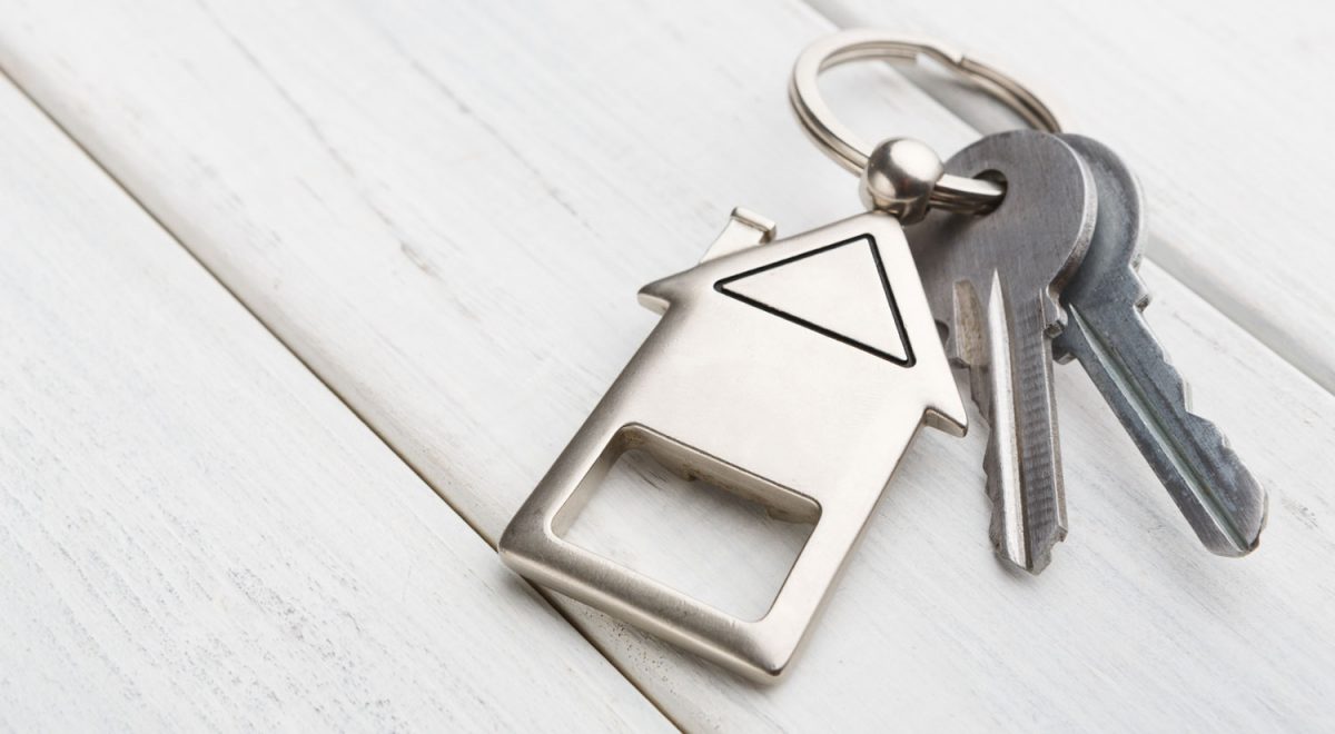 bunch-of-keys-with-house-shaped-keychain-on-white-P96P2QF-1-uai-2880x1920